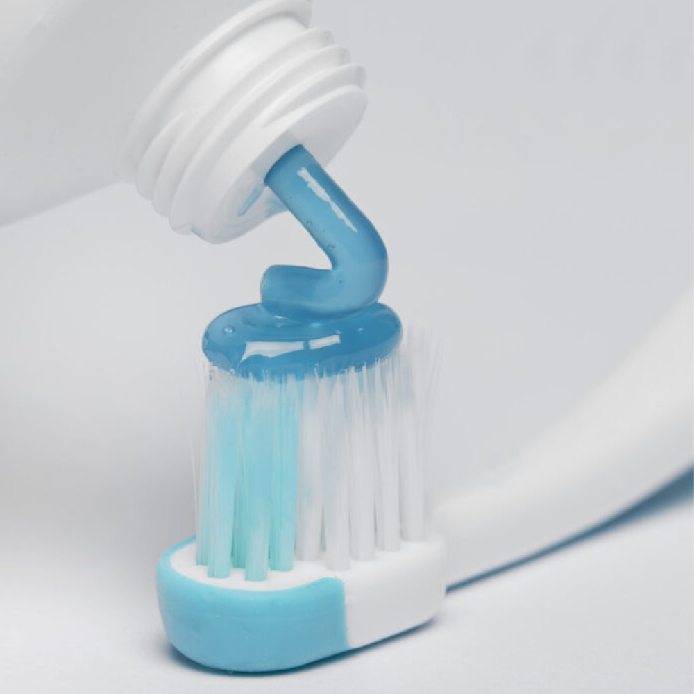 blue®m Ultrasoft kids toothbrushes in Mint with toothpaste