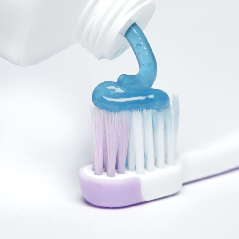 blue®m Ultrasoft kids toothbrushes in Pink with toothpaste