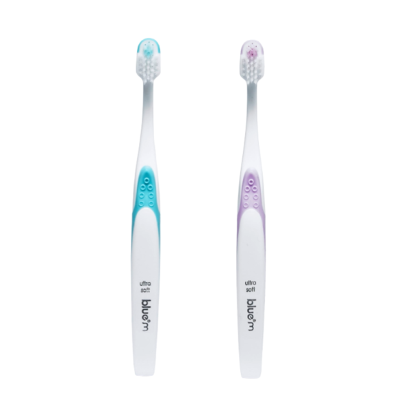 blue®m Ultrasoft kids toothbrushes in Mint and Pink