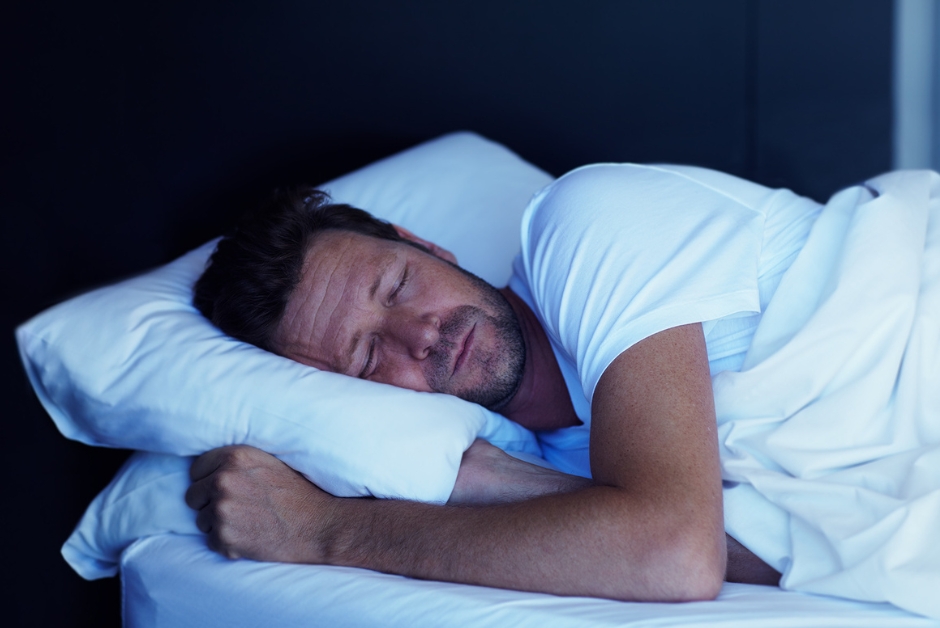 Man sleeping in bed