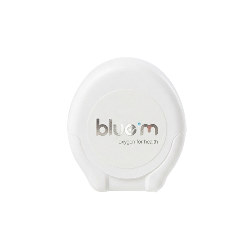 blue®m Dental Floss in a white dispenser.