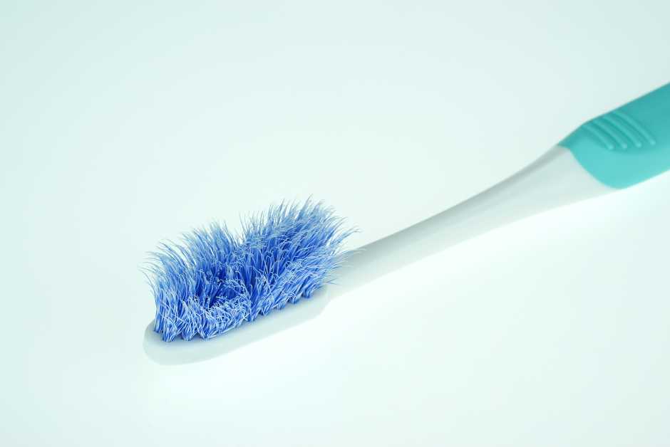 Worn toothbrush